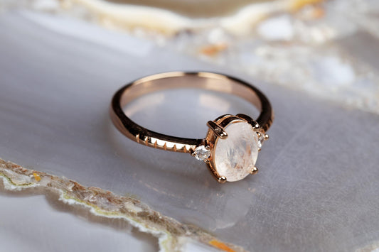 a close up of a ring on a marble surface