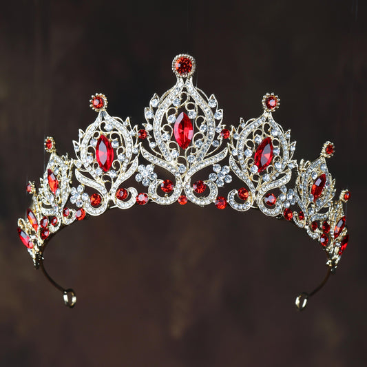 a tiara with red and white stones on it
