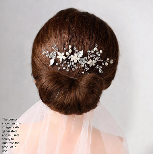a close-up view of a woman's back, focusing on her hair and a decorative hair accessory.