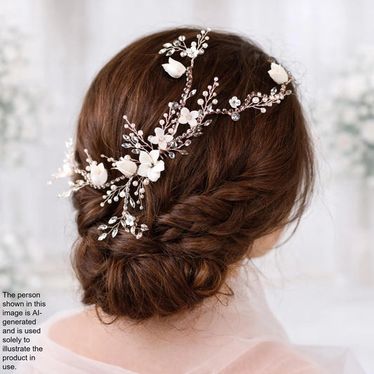 a woman's back view with her hair styled in a bun, adorned with a decorative hair accessory featuring white flowers and crystals.
