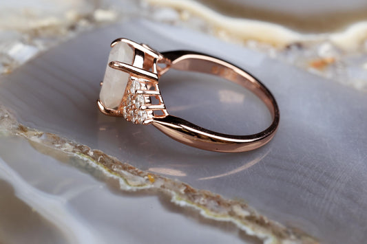 a close up of a ring on a rock
