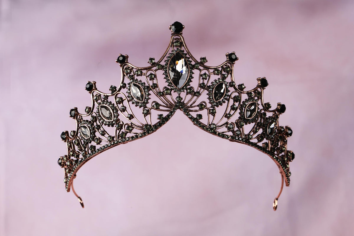 a tiara that is on a pink background