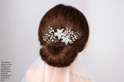 the back view of a woman's head with a decorative hair accessory, which appears to be a floral or crystal-like piece.
