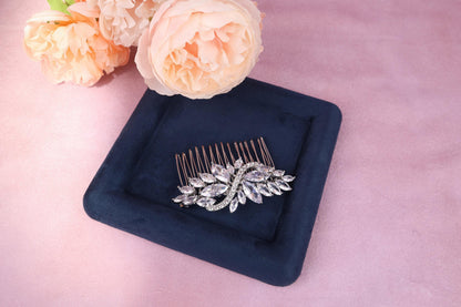 a hair comb sitting on top of a blue tray
