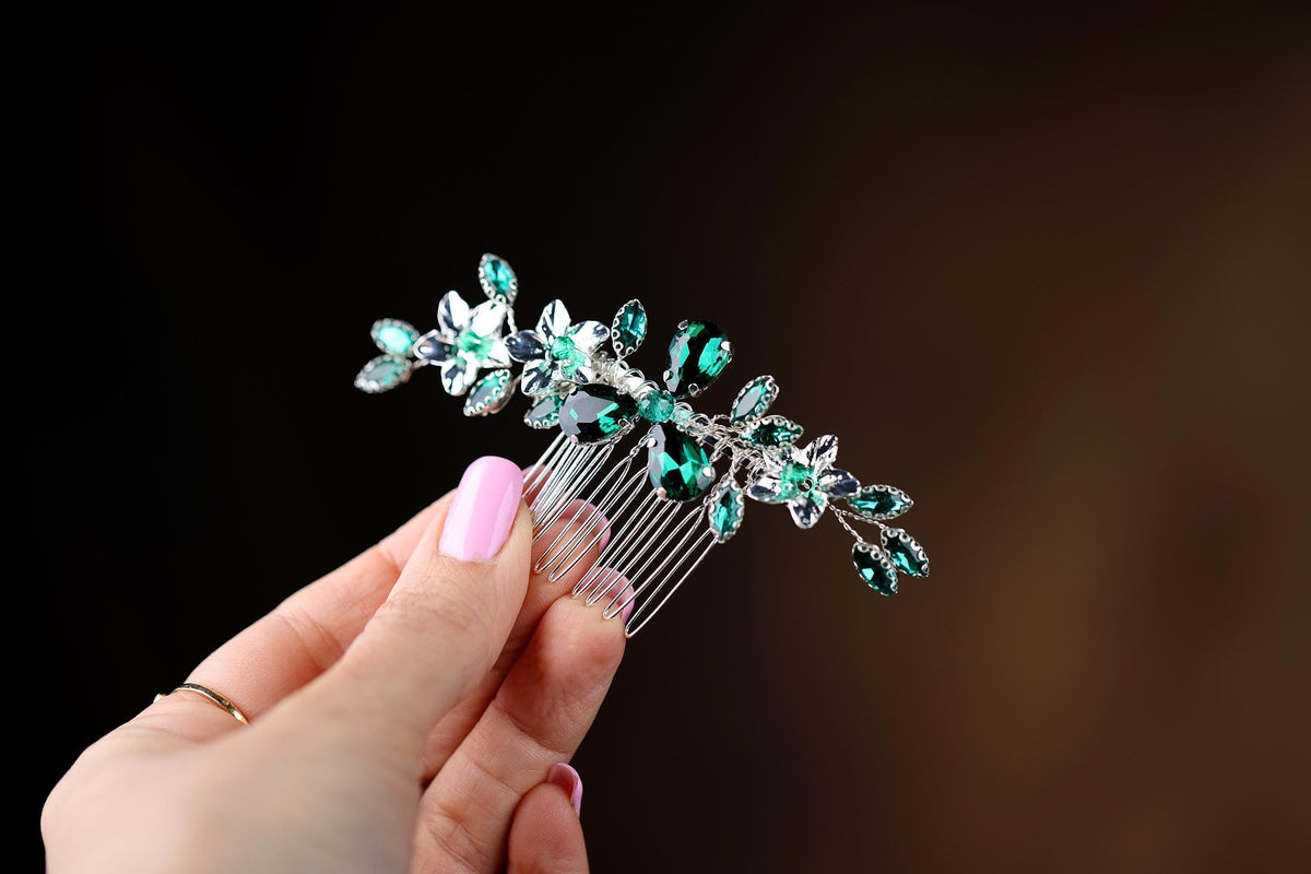 a woman is holding a hair comb in her hand