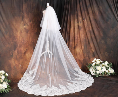 a bridal veil on a mannequin in front of a backdrop