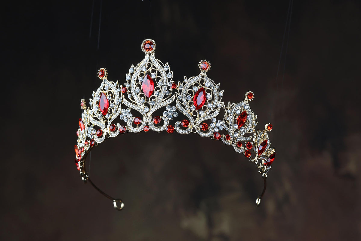 a tiara with red and white stones on it