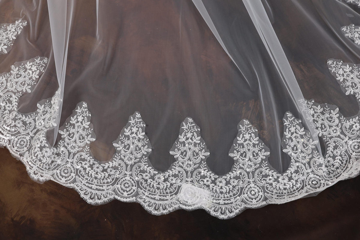 a close up of a wedding veil on a table