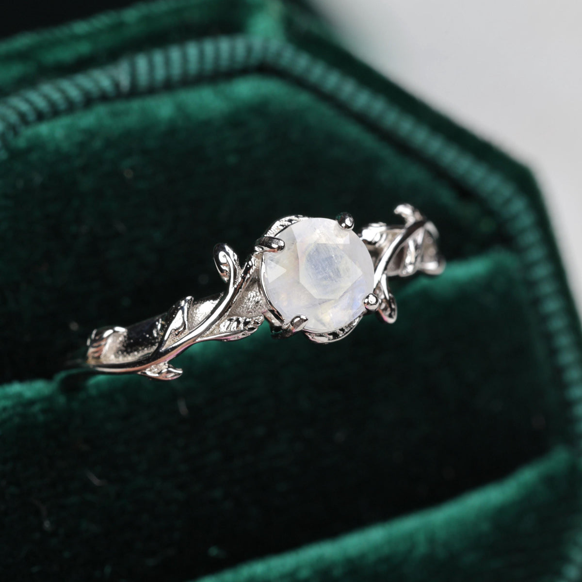 a close up of a ring in a velvet case