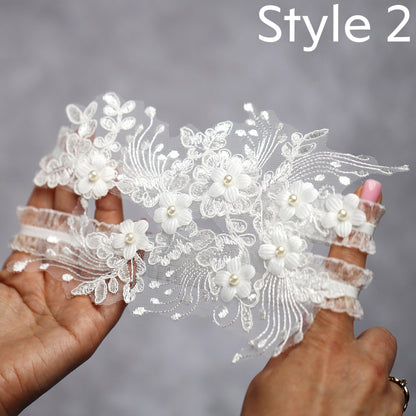 a person holding a piece of lace with flowers on it
