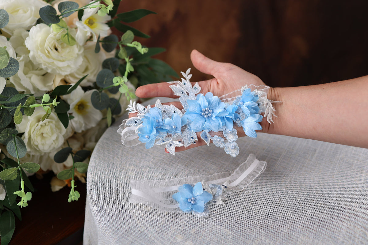 a person holding a bouquet of flowers on a table