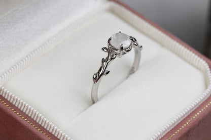 a close up of a ring in a box