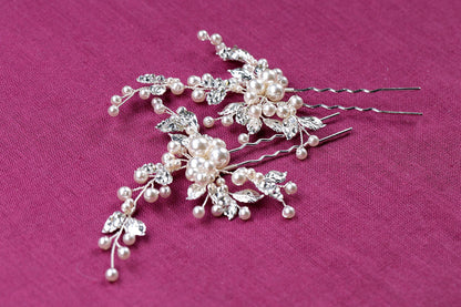 a close up of a hair comb with pearls