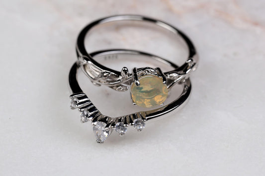 a couple of rings sitting on top of a table