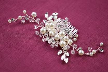 a close up of a hair comb with pearls