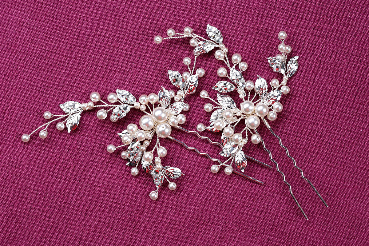 two bridal hair combs with pearls and leaves