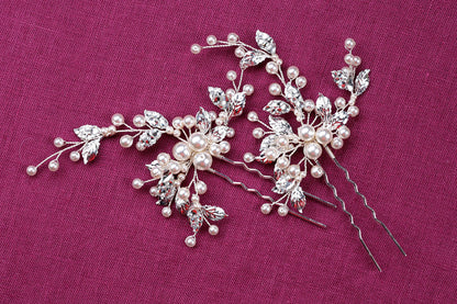 two bridal hair combs with pearls and leaves