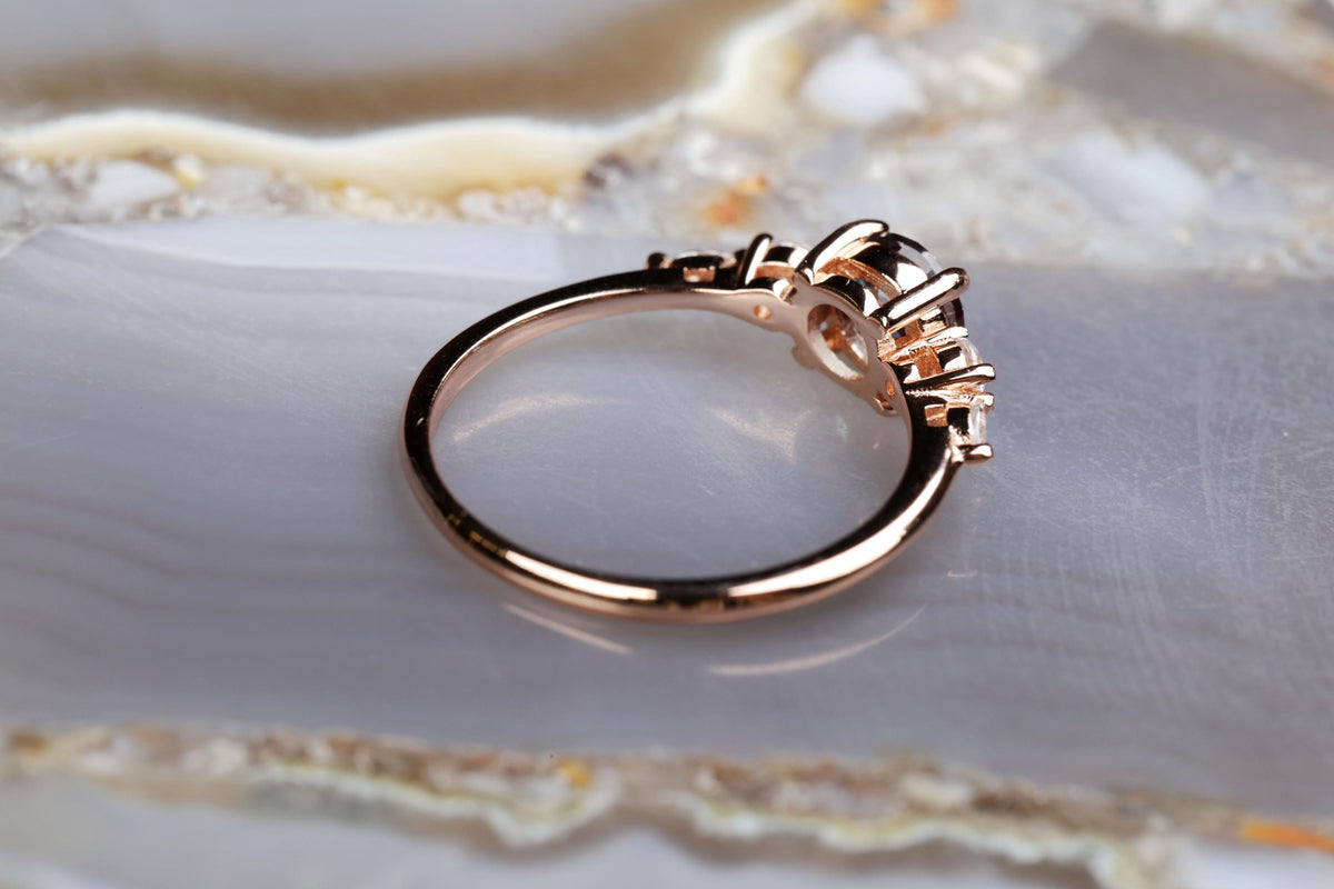 a close up of a ring on a marble surface