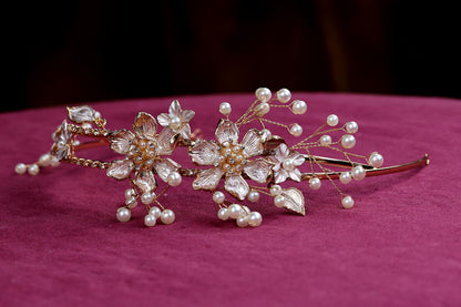 a close up of a hair comb with pearls