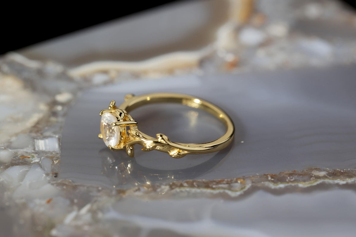 a close up of a ring on a marble surface