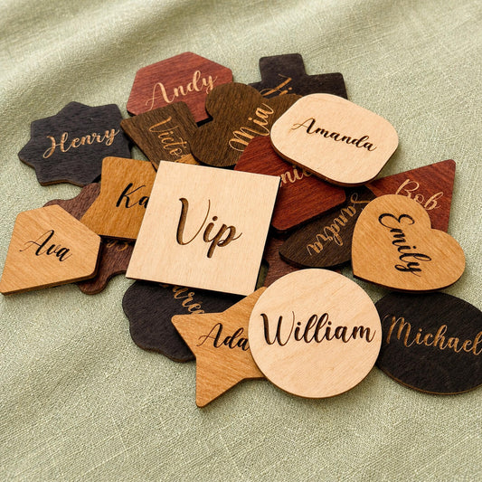 various wooden name tags or coasters with names written on them, such as "Henry", "Vip", "Amanda", "William", "Michael", and "Ava".