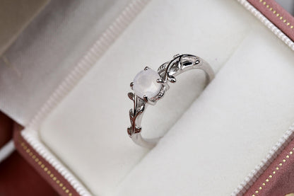 a close up of a ring in a box