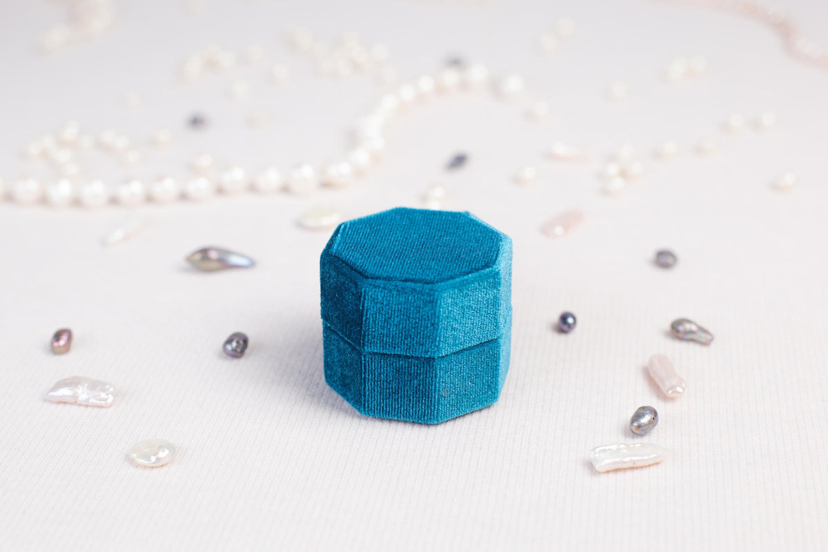 a small blue object sitting on top of a table