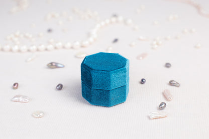a small blue object sitting on top of a table