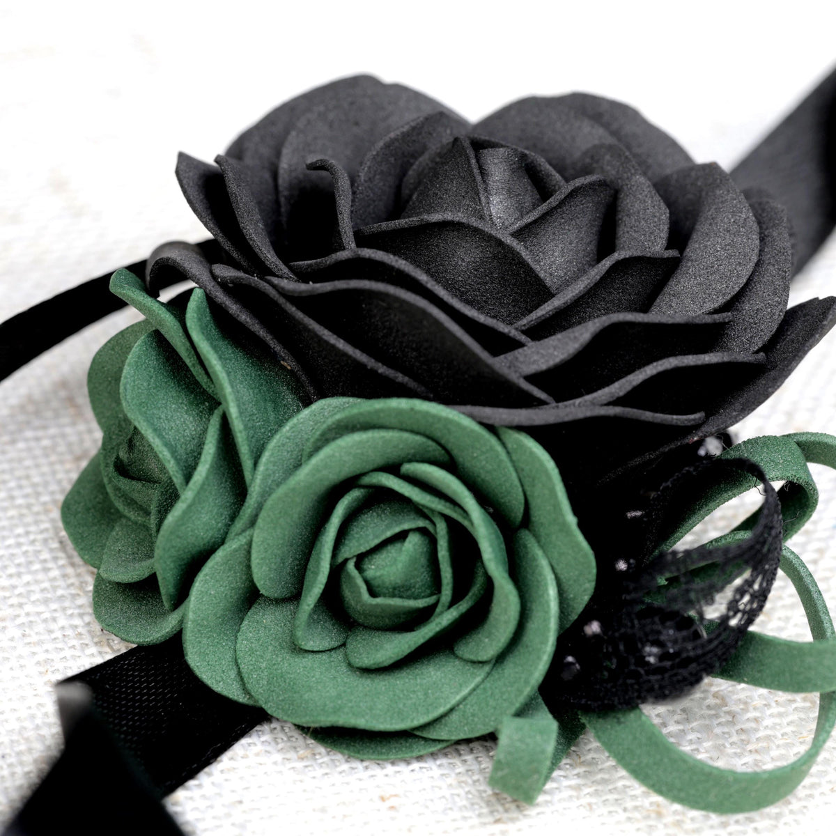 a close up of a black and green flower