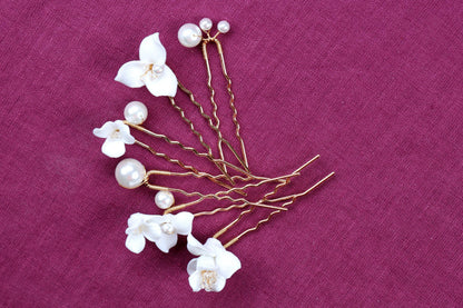 a close up of a hair comb with flowers on it