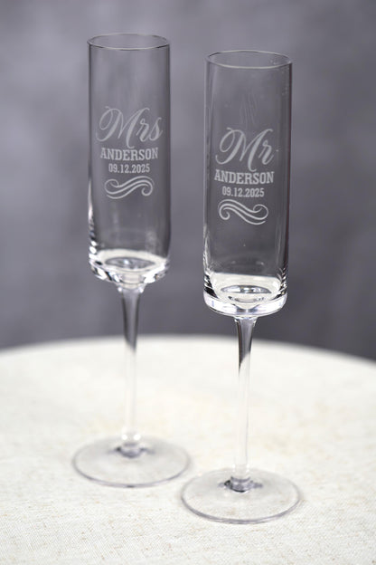 a couple of wine glasses sitting on top of a table