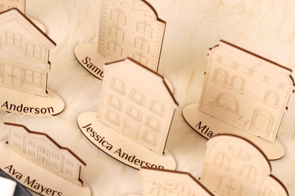 several wooden name cards with the names of various individuals, such as Anderson, Jessica Anderson, and Ava Mayer, printed on them.