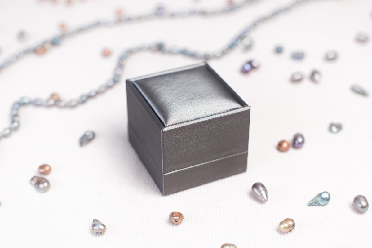a small metal box sitting on top of a table