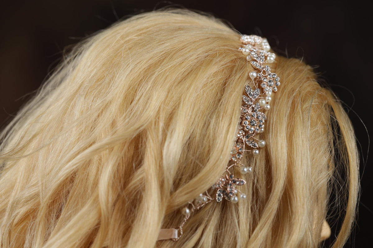 a woman with blonde hair wearing a headband
