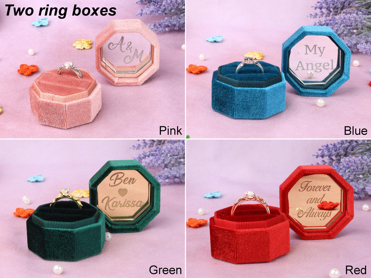 four ring boxes with different designs on them