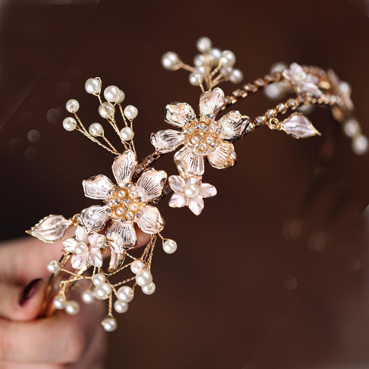 a close up of a person holding a piece of jewelry