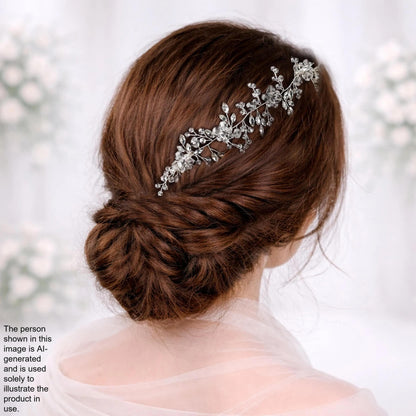 a woman's back view with her hair styled in a bun and adorned with a decorative hair accessory.