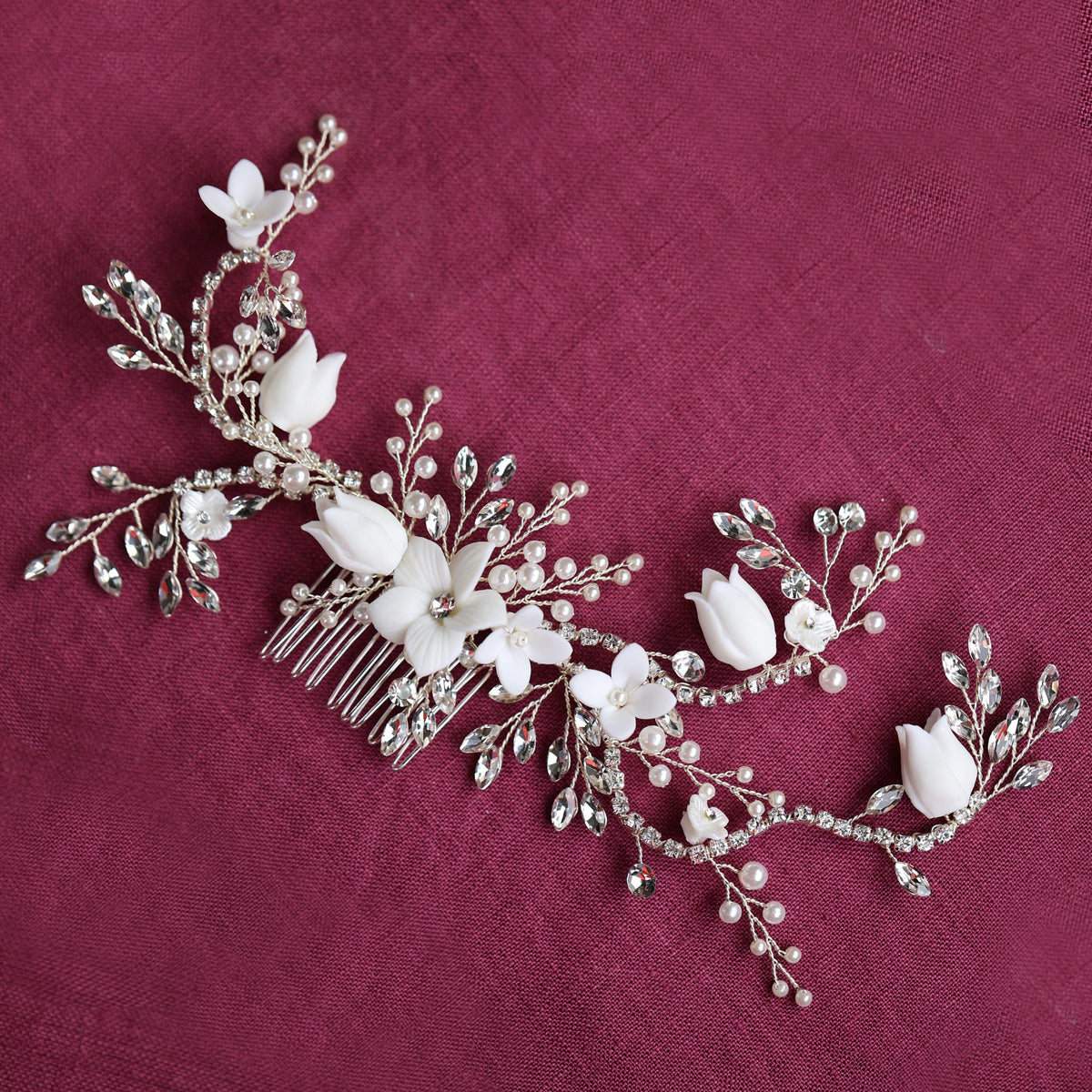 a bridal hair comb with flowers and pearls