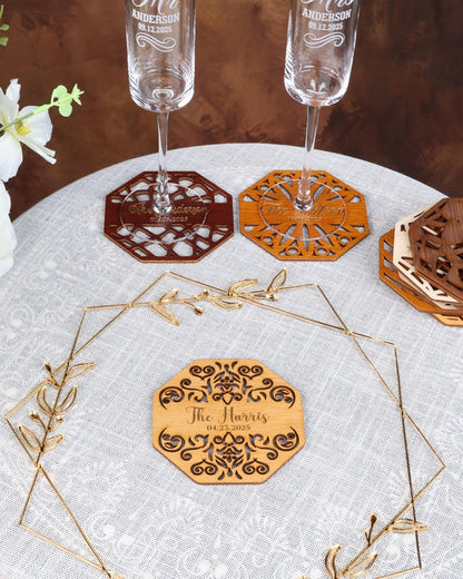 a white table topped with three wine glasses