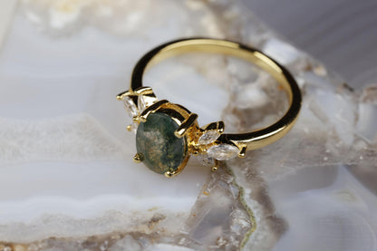 a close up of a ring with a stone