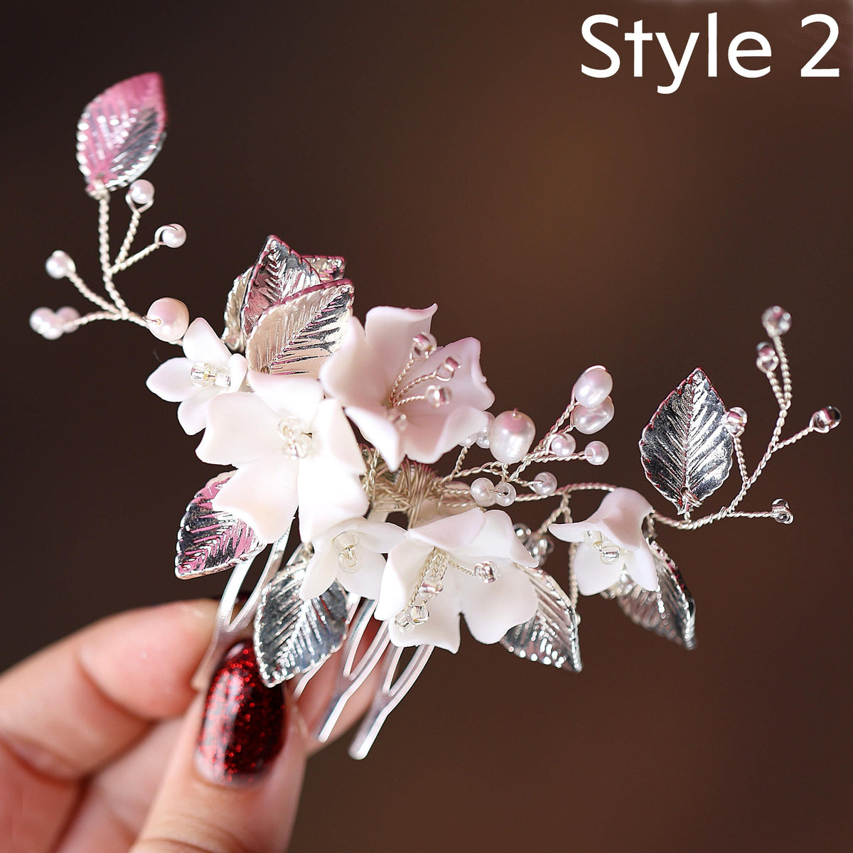 a person holding a flower and a hair comb