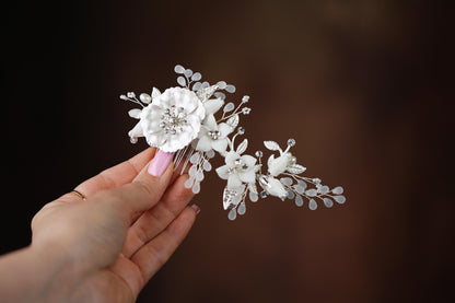 a person holding a flower in their hand