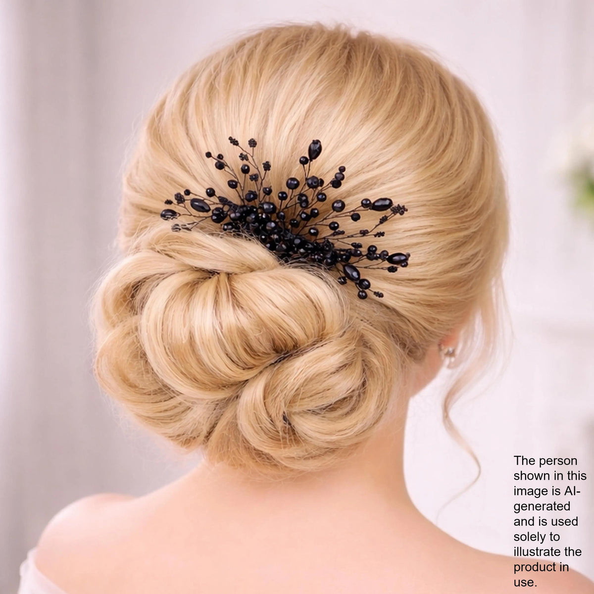 the back view of a woman's blonde hair with a decorative hair accessory, possibly a hair clip or hairpiece, in the center of her hair.