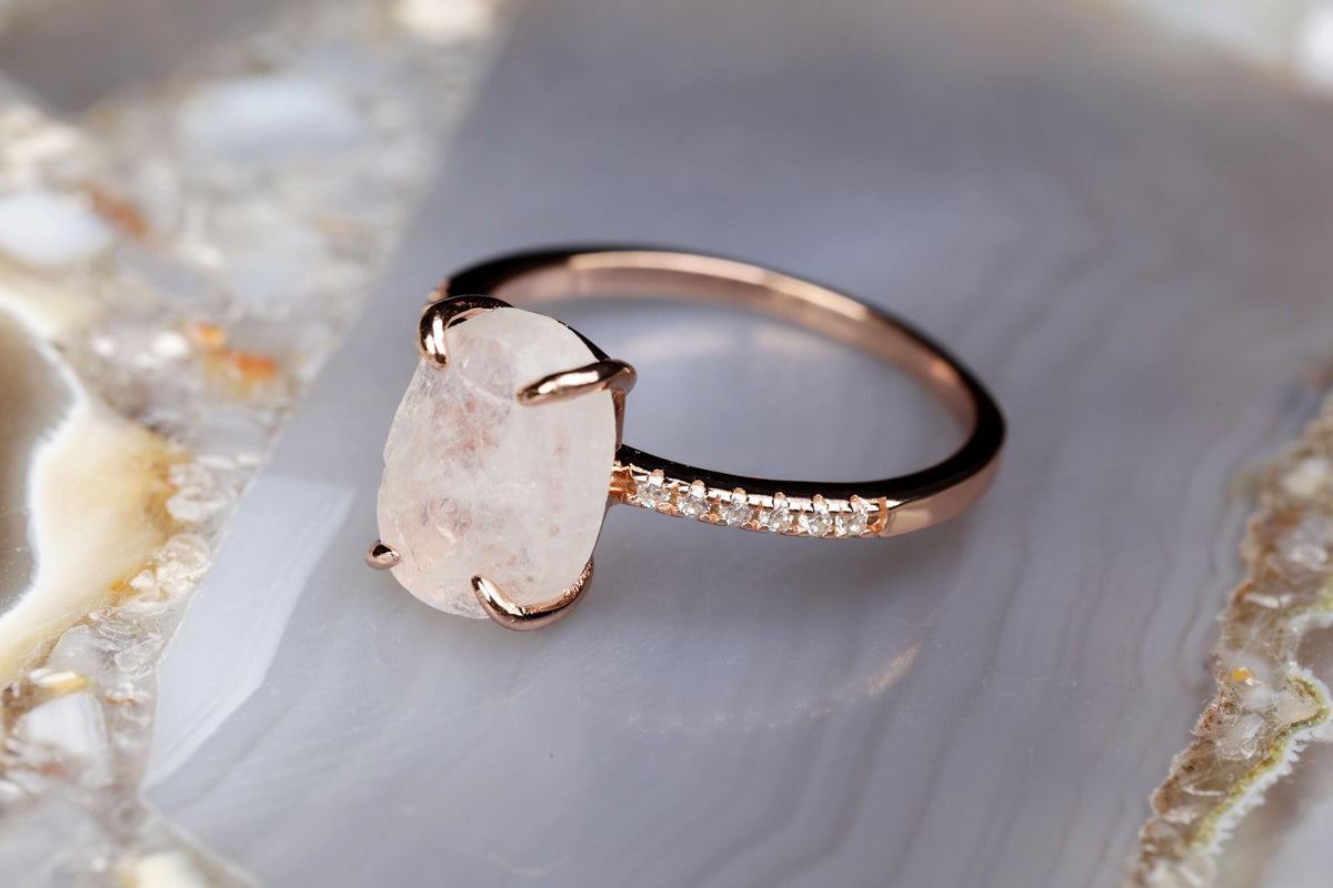 a close up of a ring on a rock