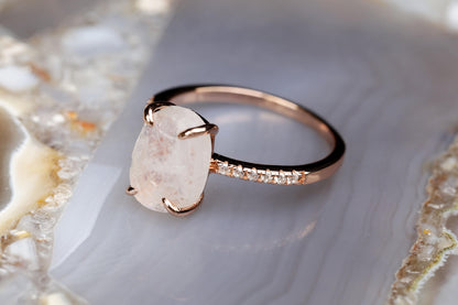 a close up of a ring on a rock