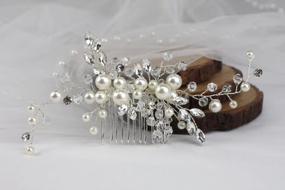 a close up of a hair comb with pearls