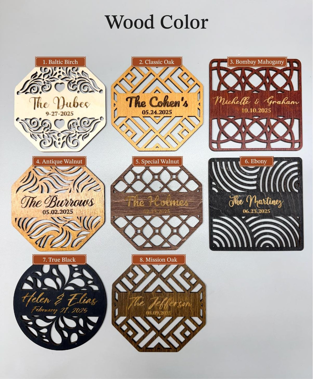 a collection of nine wooden coasters or nameplates, each with a unique design and color. The coasters are arranged in a grid format, showcasing various patterns and colors.