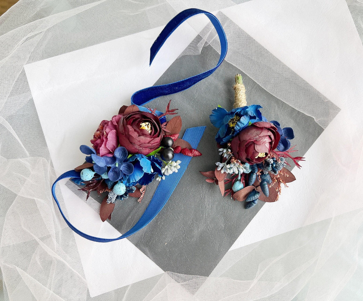 a couple of flowers on top of a piece of paper