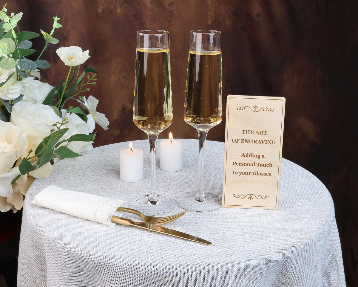 a table topped with two glasses of wine