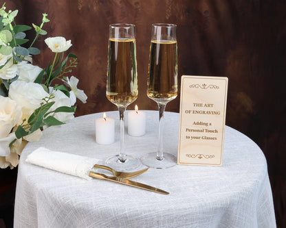 a table topped with two glasses of wine